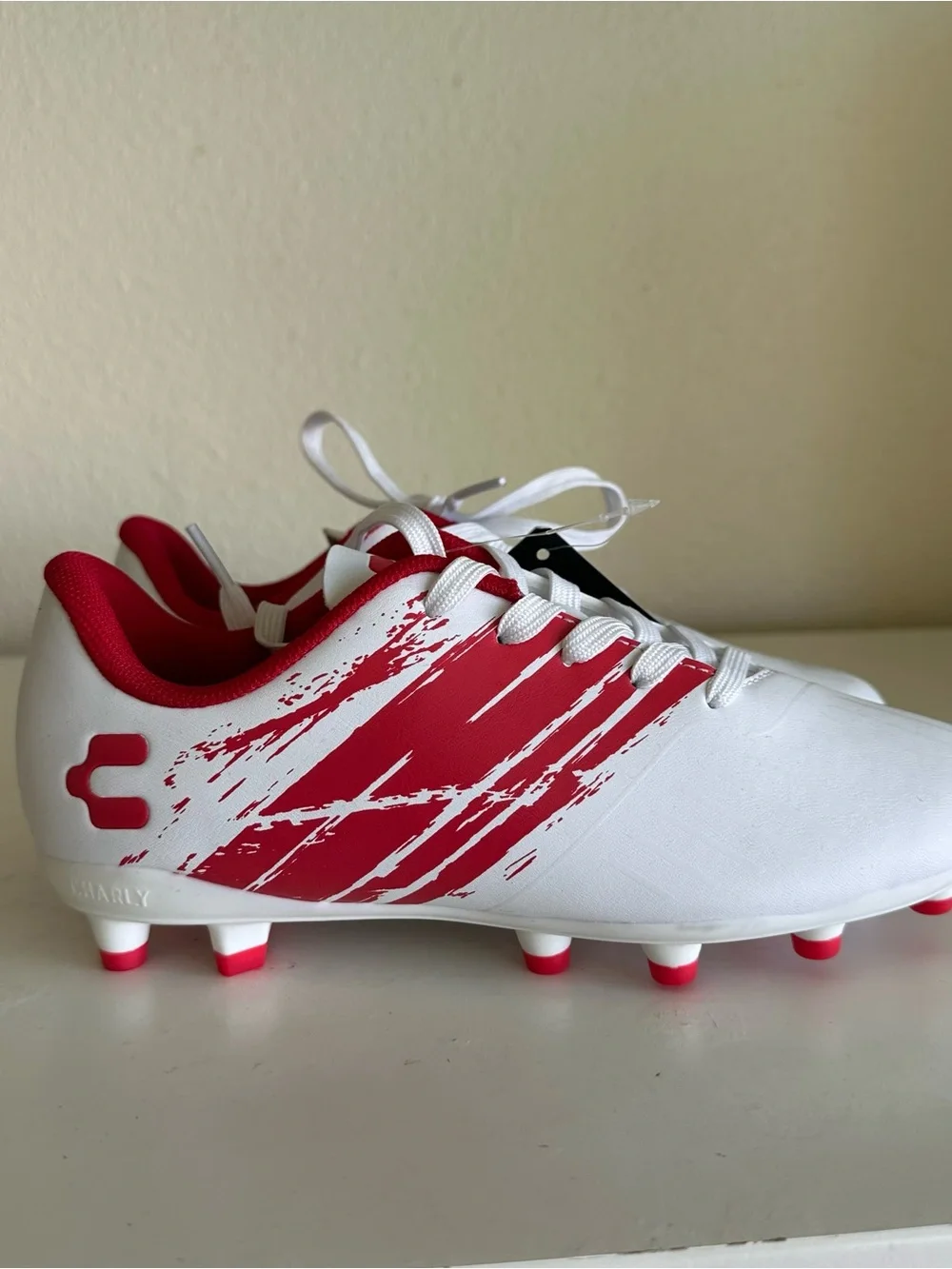 Charly Grasshopper Youth firm ground cleats Size:2.5